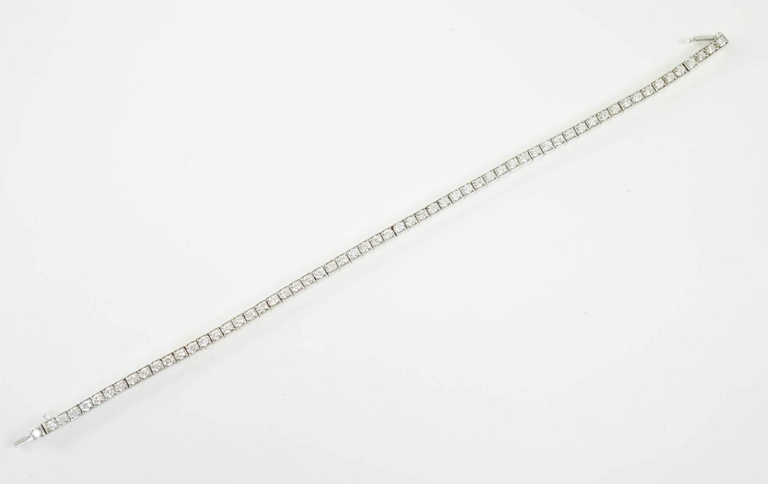 A late 20th century Cartier 18ct white gold and diamond set line bracelet